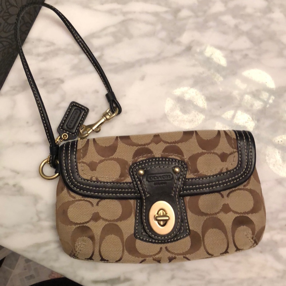 Brown and tan coach wristlet
